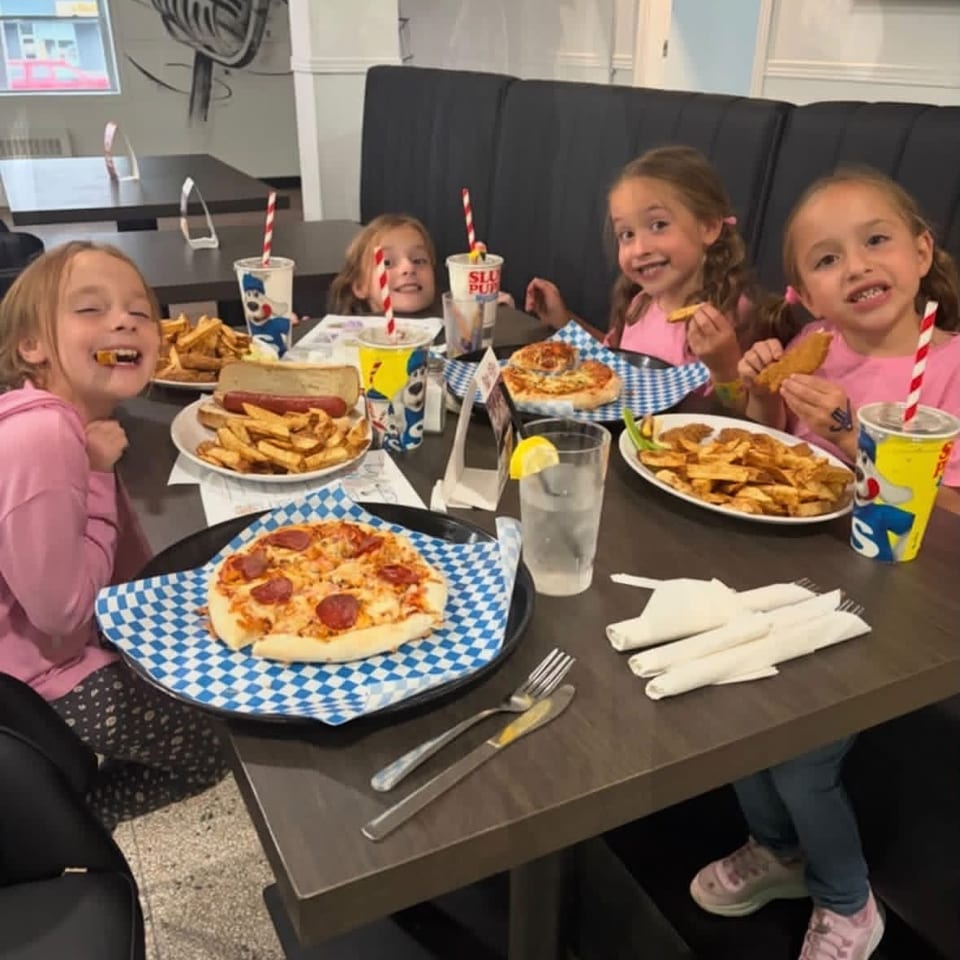 Children enjoying a meal at the restaurant