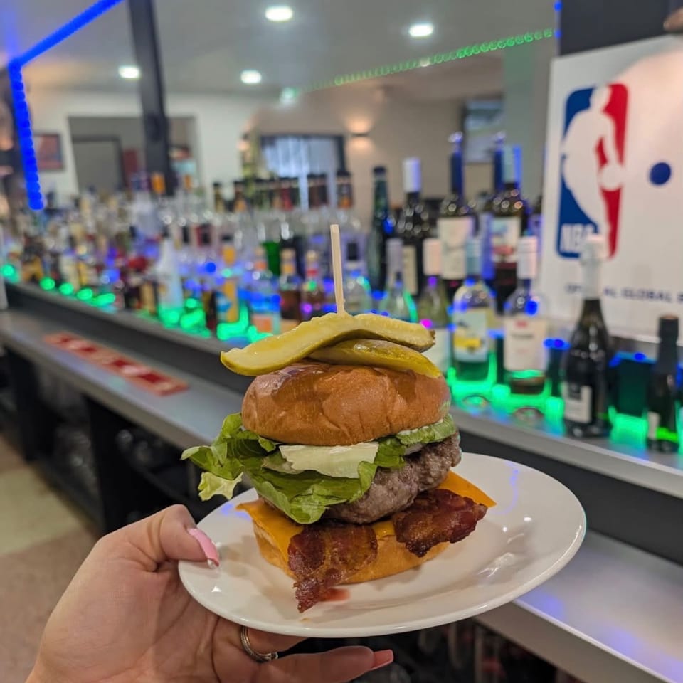 Burger served at the bar